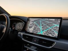Il nuovo Android Auto cambia lo schermo della tua auto: la guida per chi non è esperto Schermo infotainment con mappa 3D Android Auto aggiornamento 2026 su cruscotto auto moderna