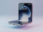 Il primo iPhone pieghevole della storia arriva a settembre: conviene aspettarlo? Concept render di iPhone pieghevole 2026 a conchiglia semi-aperto con schermata iOS e orario 9:41 su sfondo sfumato blu-viola