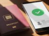 Passaporto su Google Wallet in Italia: cos’è ID Pass e dove non funziona Passaporto elettronico con chip NFC accanto a smartphone con schermata di verifica identità digitale Google Wallet